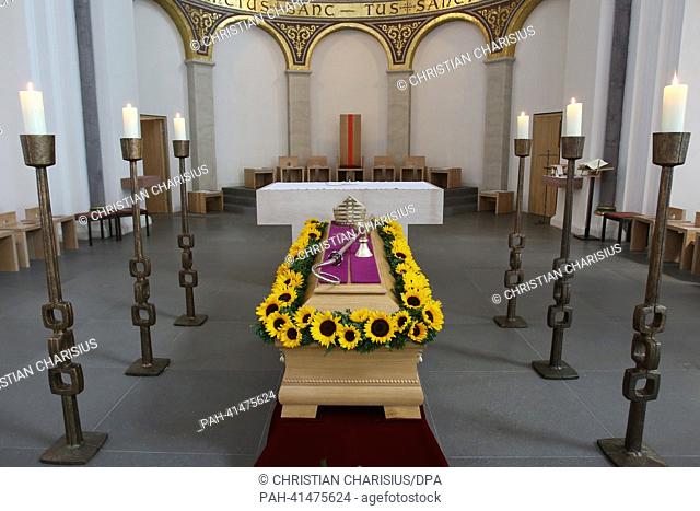 The coffin of Archibishop Ludwig Averkamp is decorated with flowers before the funeral and burial at St. Mary's Cathedral in Hamburg,  Germany, 02 August 2013