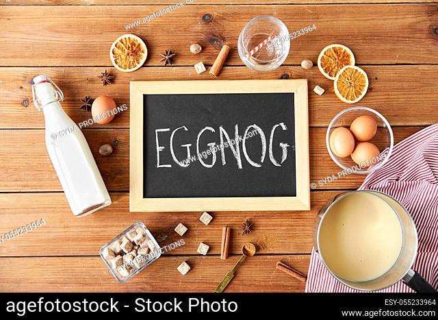 eggnog word on chalkboard, ingredients and spices