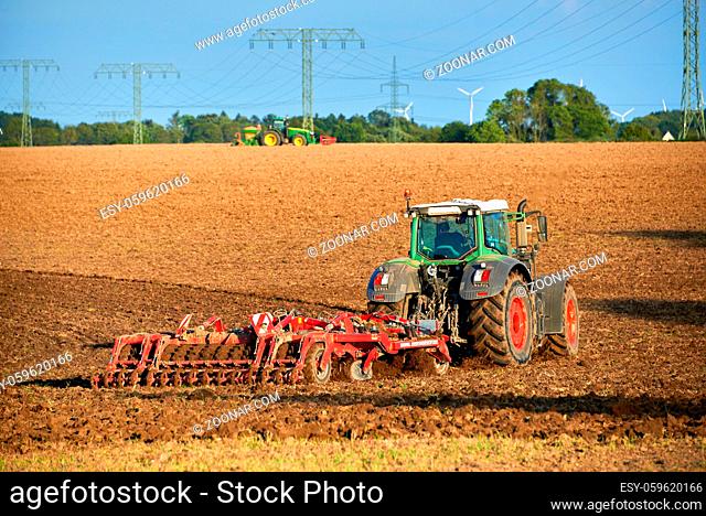 earth preparation after harvesting with tractor