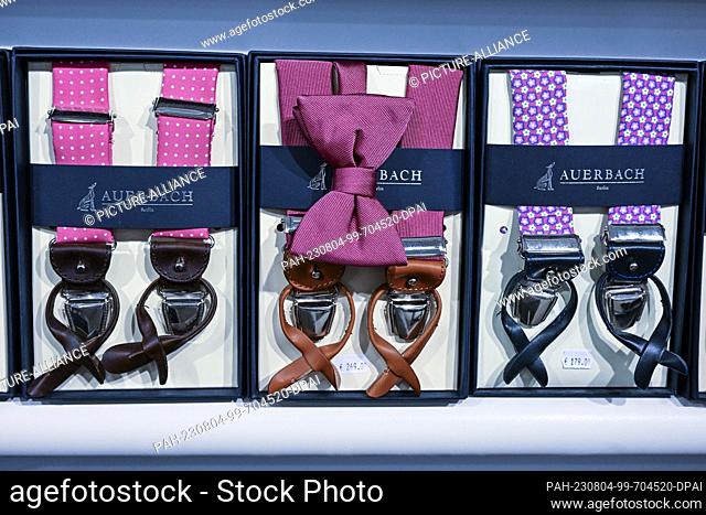 ILLUSTRATION - 02 August 2023, Berlin: Handmade suspenders with matching bow are offered in the men's outfitter ""Auerbach Manufaktur""
