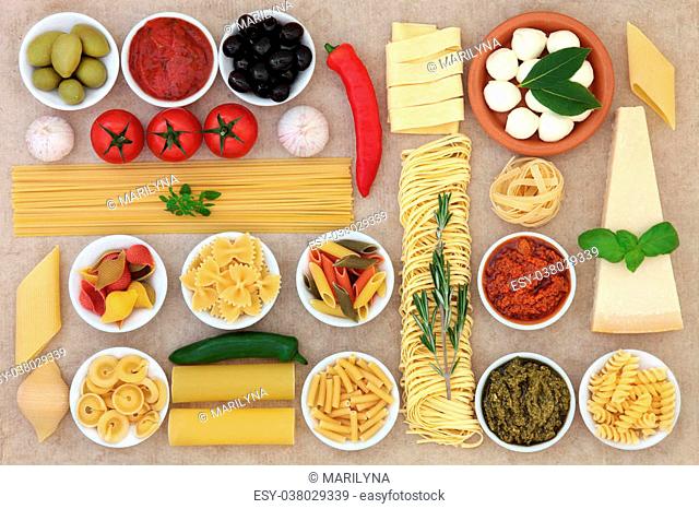 Healthy italian food collection forming an abstract background over natural hemp paper