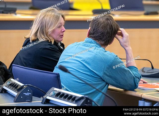 18 December 2023, Bavaria, Regensburg: The defendant sits next to his defense lawyer Stephanie Bauer in the courtroom of the district court