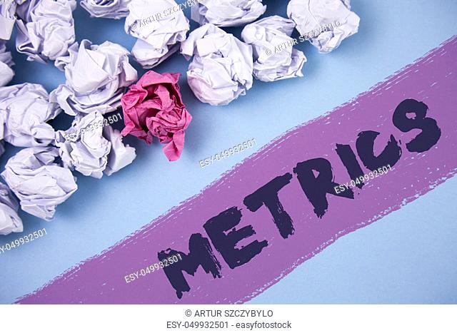Word writing text Metrics. Business concept for Method of measuring something Study poetic meters Set of numbers written Painted background Crumpled Paper Balls...