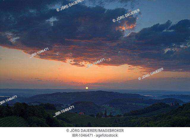Sunrise over the hilly landscape of Styria seen from Kitzeck im Sausal, Austria, Europe