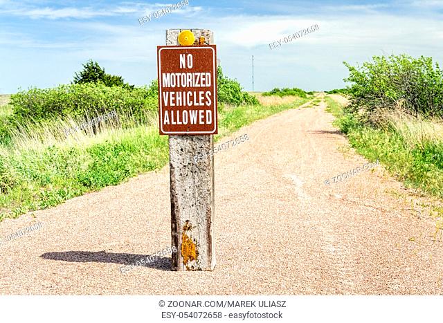 multi-use recreational Cowboy Trail in northern Nebraska with no motorized vehicles sign