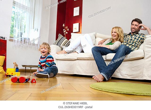 Family playing in living room