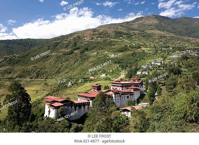 Trongsa Dzong set among tree-covered hills near the town of Trongsa, Bhutan, Asia