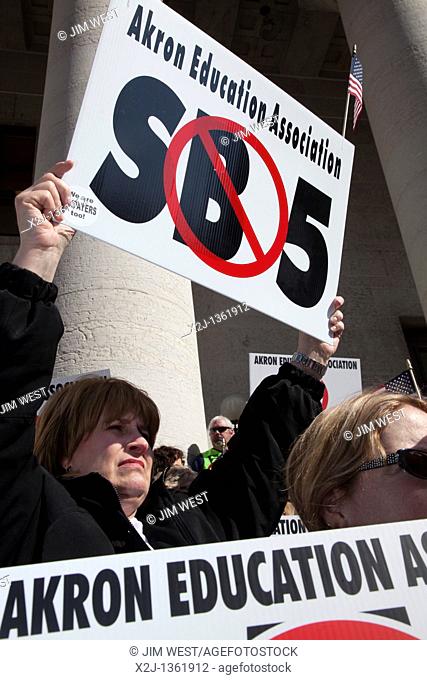 Columbus, Ohio - Union members rally at the Statehouse against SB5, a bill promoted by Ohio Governor John Kasich that would restrict collective bargaining...