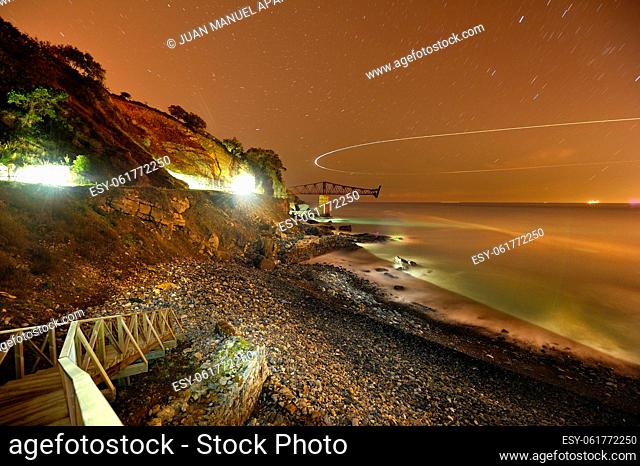 Dicido beach and mineral loading photographed at night in Mioño (Castro Urdiales) Cantabria, Spain