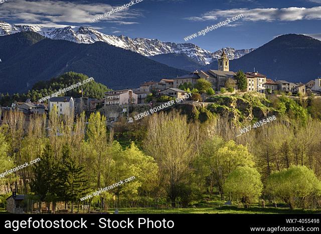 Bellver de Cerdanya panoramic views in spring, with the snowy Serra del Cadí in the background (Cerdanya, Catalonia, Spain, Pyrenees)