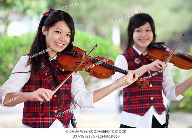 Female violinists at play in Puli, Taiwan