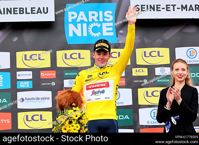 Danish Mads Pedersen of Trek-Segafredo celebrates on the podium in the yellow jersey of leader in the overall ranking after the second stage of the 81st edition...