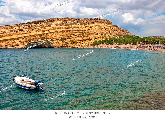 Matala beach and ancient caves on rocks. Crete island. Greece