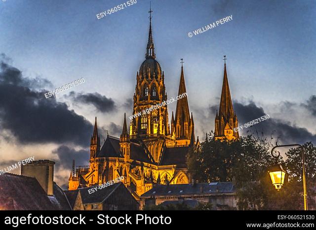 Night Outside Illuminated Lights Bayeux Cathedral Our Lady of Bayeux Church Bayeux Normandy France. Catholic church consecrated by King William the Conquerer in...