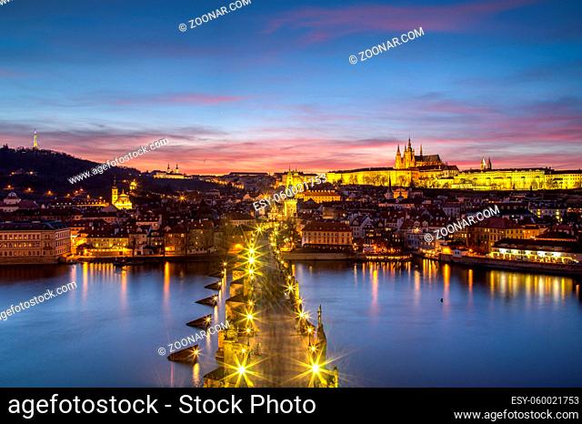 Prague, Czech Republic - March 16, 2017: Evening view of Prague Castle and Charles Bridge from the Old Town Bridge Tower