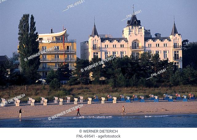 Tourists on beach, Palace Hotel, Zinnowitz, Usedom, Mecklenburg-Western Pomerania, Germany