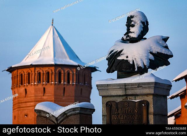 RUSSIA, VLADIMIR REGION - DECEMBER 8, 2023: A snow-covered bust of Prince Dmitry Pozharsky is seen by the Saviour Monastery of St