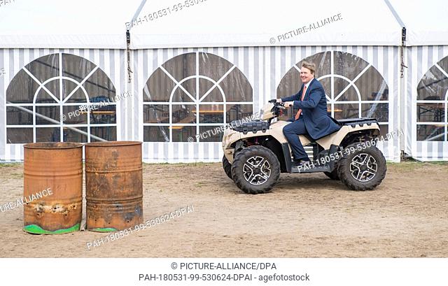 King Willem-Alexander of The Netherlands at Kamp Soesterberg, on May 31, 2018, for a workvisit to the Fieldlab Smartbase van het Commando...