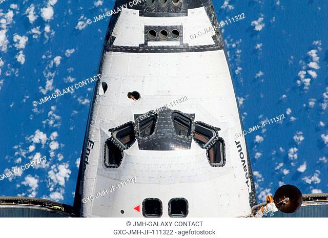 This view of the crew cabin of the space shuttle Endeavour was provided by an Expedition 22 crew member during a survey of the approaching vehicle prior to...
