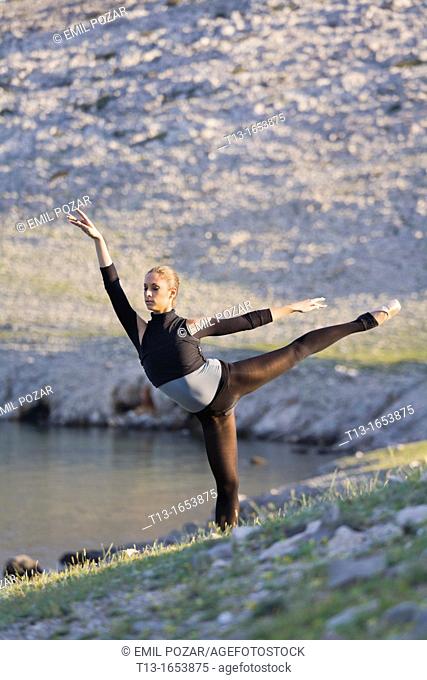 Ballerina dancing in a natural environment