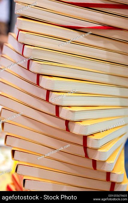 Stack of books stored as Education and business concept