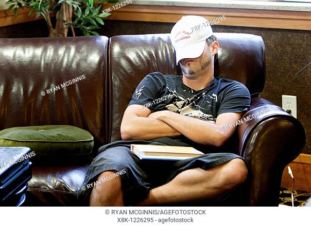 Storm chaser Justin Walker catches a nap in Kearney, Nebraska, June 1, 2010  Justin is working with Project Vortex 2, a two year mission to study tornadoes...