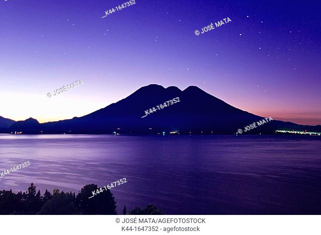 Sunrise at Lake Atitlán in Guatemala with volcanoes Tolimán and Atitlán in the background