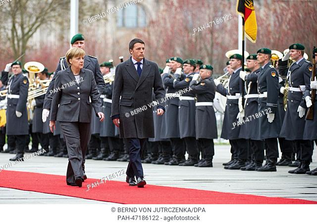 New Italian Prime Minister Matteo Renzi is welcomed military honors by German Chancellor Angela Merkel (CDU) during his first official visit in front of the...