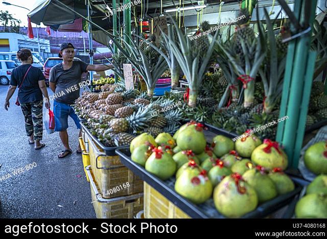 Hawker stalls at Kemyalang Park during the festive Chinese New Year in Kuching, Sarawak, East Malaysia, Borneo, offer a variety of traditional delicacies and...