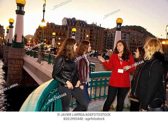 Group of tourists and guide making a tour of the city, La Zurriola bridge, Urumea river, Donostia, San Sebastian, Gipuzkoa, Basque Country, Spain, Europe