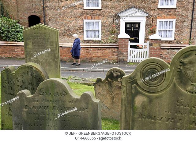 UK, England, North Yorkshire, Thirsk, Cemetery Road, The Parish Church of St. Mary 15th century, graveyard, headstones