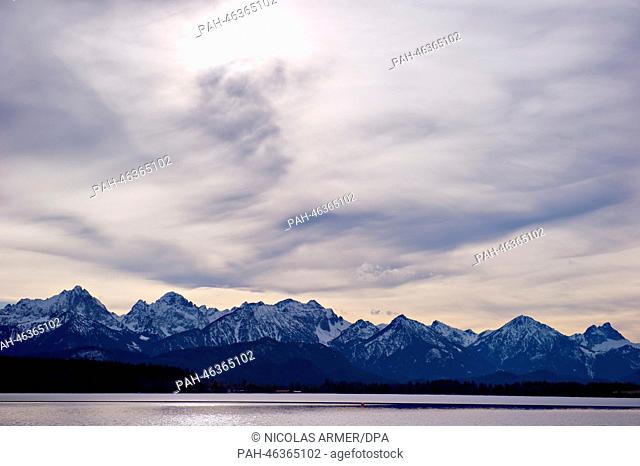 The Alpine panorama is pictured behind Lake Bannwaldsee near Buching, Germany, 15 February 2014. Warm temperatures and a clear sky make for a springlike...