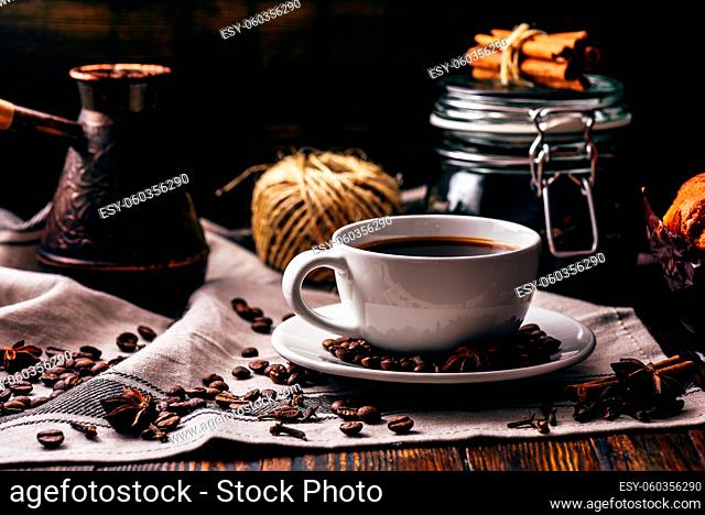 White cup of turkish coffee with spices