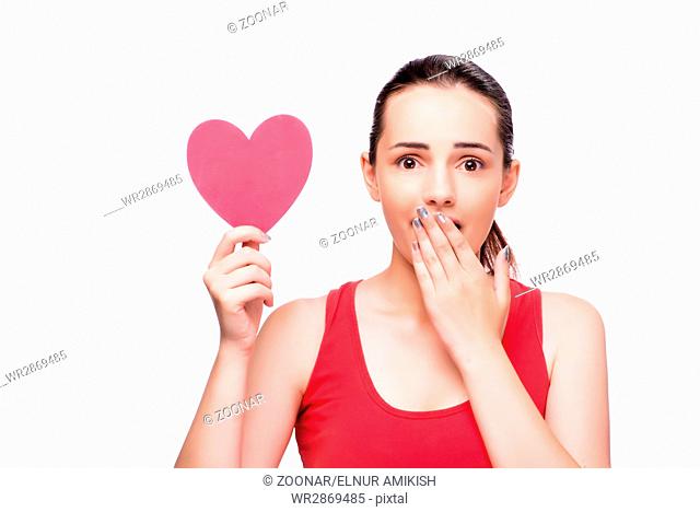 Young woman with heart shaped isolated on white