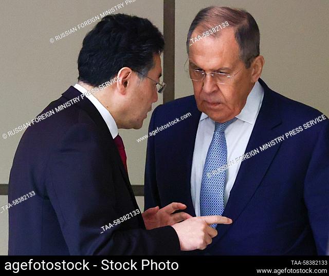 UZBEKISTAN, SAMARKAND - APRIL 13, 2023: Russia's Foreign Minister Sergei Lavrov (R) listens to his Chinese counterpart Qin Gang during a bilaterla meeting on...