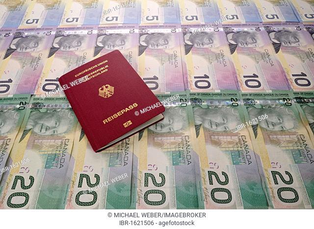 Passport of the Federal Republic of Germany on various Canadian dollar bills