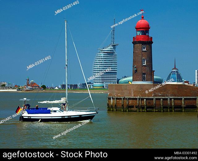 Lighthouse at Geestemnde, fishing port with Atlantic Hotel Sail City, Klimahaus and Mediterraneo, Bremerhaven, Bremen, Germany