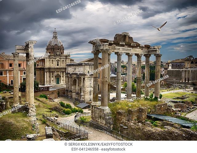 Ruins of the Roman Forum and thunderclouds