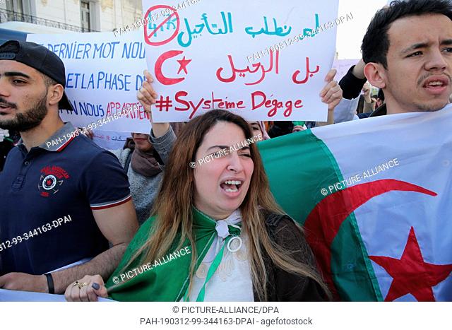 dpatop - 12 March 2019, Algeria, Algiers: Algerian students demonstrate one day after President Abdelaziz Bouteflika announced his withdrawal from the...