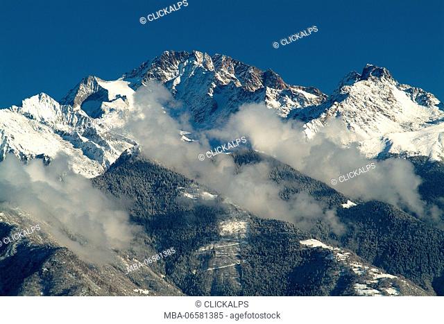 Mount Disgrazia and the peaks surrounding it capped by a winter snowfall, Valmasino, Valtellina, Lombardy, Europe