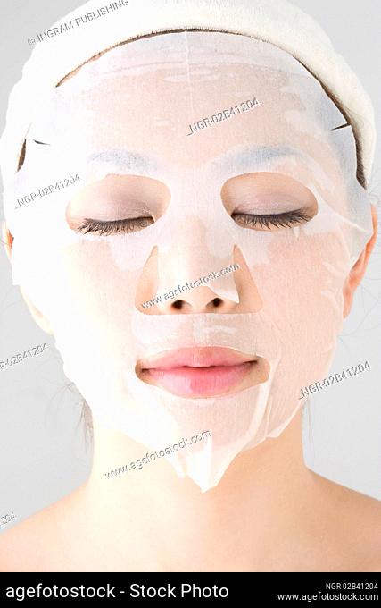 Face of woman with a facial pack