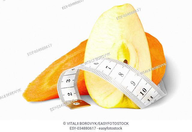 Slices Carrot With Apple And Sewing Measuring Isolated On White Background
