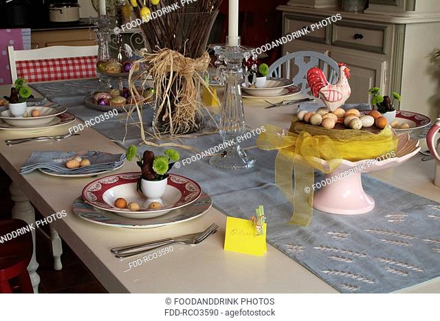 Easter place settings with cake and decorations