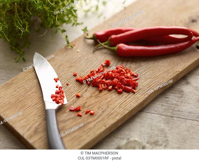 Knife with chopped chili pepper
