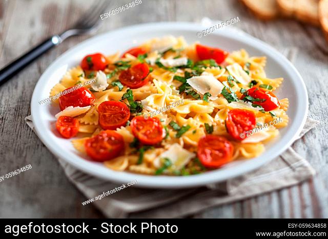 Pasta with fresh tomatoes and basil. High quality photo