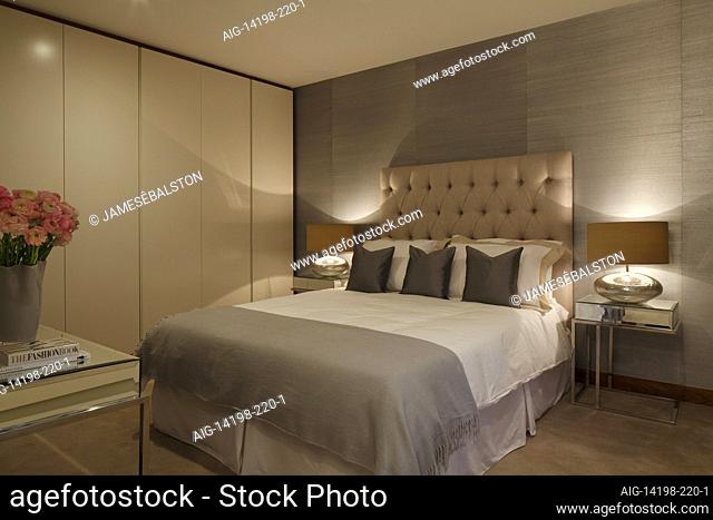 Night shot of pale blue-grey guest bedroom | Architect: Emrys | Designer: Jess Lavers
