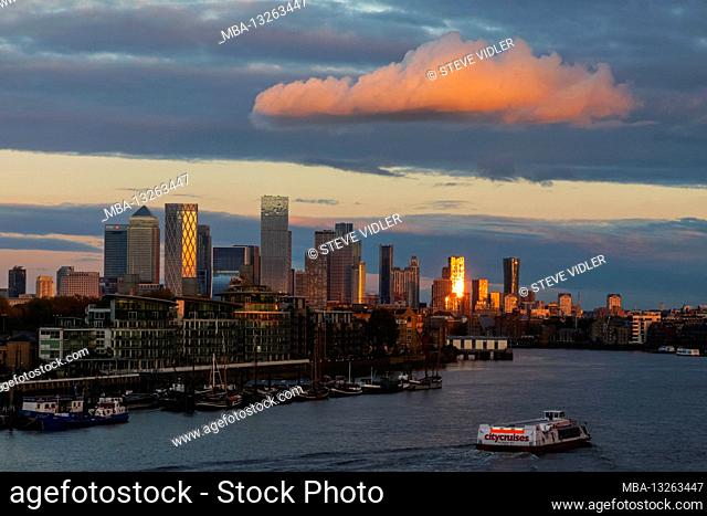 England, London, Docklands, River Thames and Canary Wharf Skyline in the Late Afternoon Light