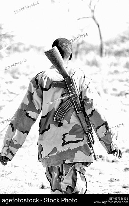 africa in the land of ethiopia a black soldier and his gun looking the boarder