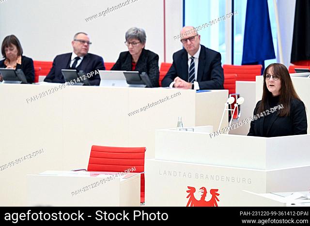 20 December 2023, Brandenburg, Potsdam: Katrin Lange (r, SPD), Brandenburg Minister of Finance and for Europe, speaks during the special session of the...