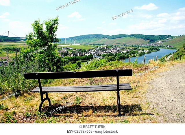 bench high above the mosel overlooking earth and ürzig\r\n